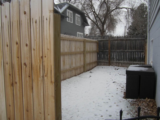 view of yard covered in snow