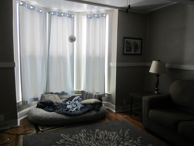 sitting room with hardwood / wood-style floors