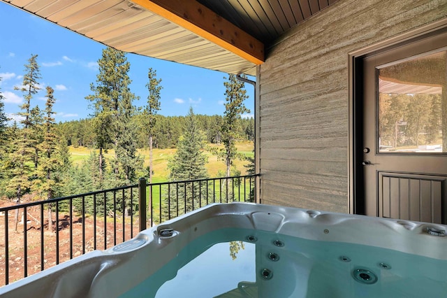 balcony with a hot tub