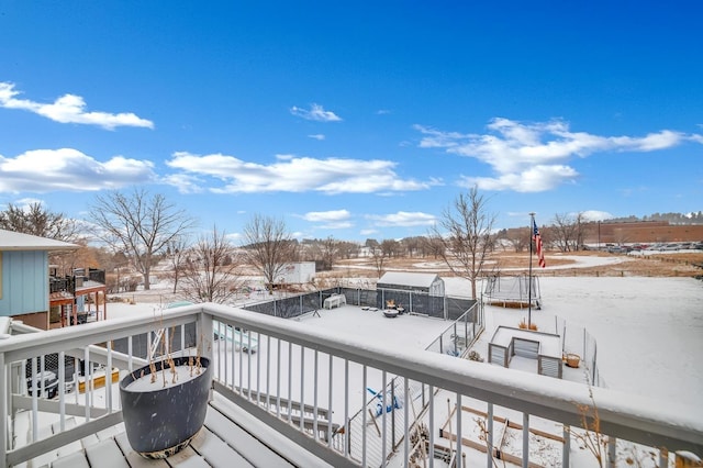 view of snow covered deck