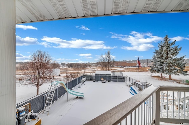 view of snow covered deck