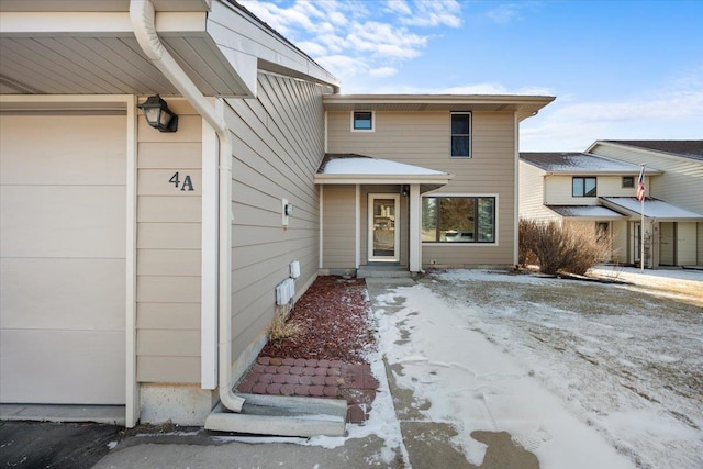 property entrance featuring a garage