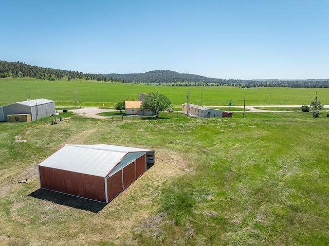 exterior space with a mountain view and a rural view