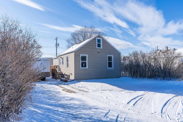 view of snow covered property