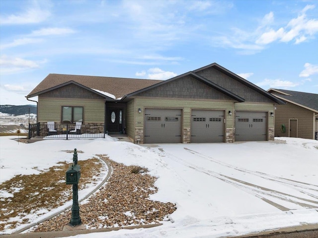 view of front of property featuring a garage