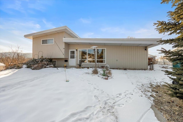 view of snow covered property