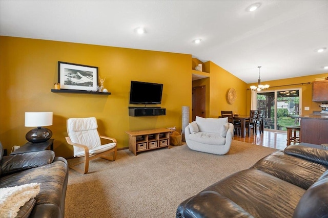 carpeted living area featuring lofted ceiling, recessed lighting, baseboards, and an inviting chandelier