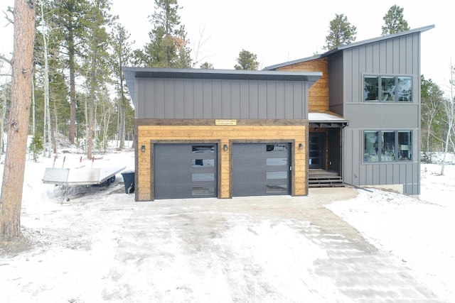 view of front of home featuring a garage and board and batten siding