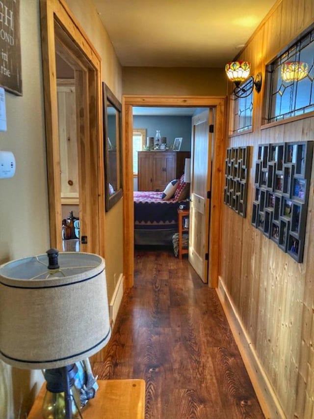 corridor with dark wood-type flooring