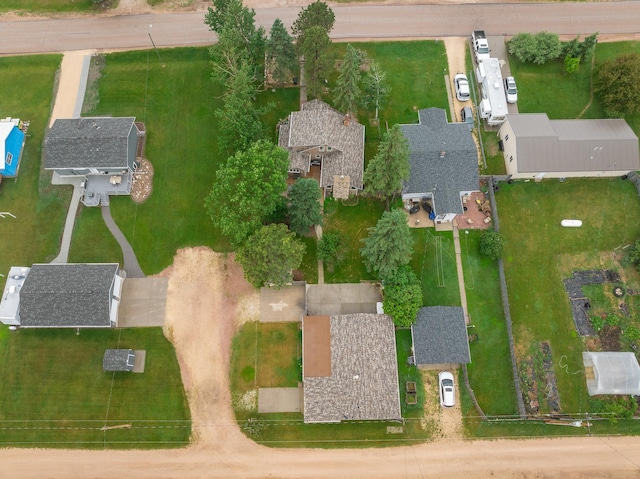 birds eye view of property with a residential view