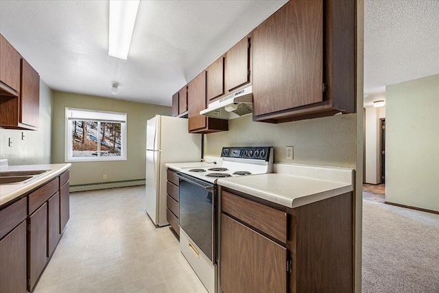 kitchen featuring electric stove, light floors, light countertops, a baseboard heating unit, and under cabinet range hood