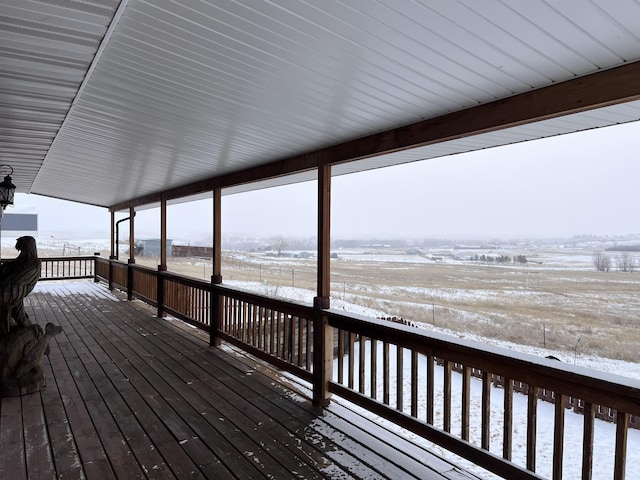 view of snow covered deck