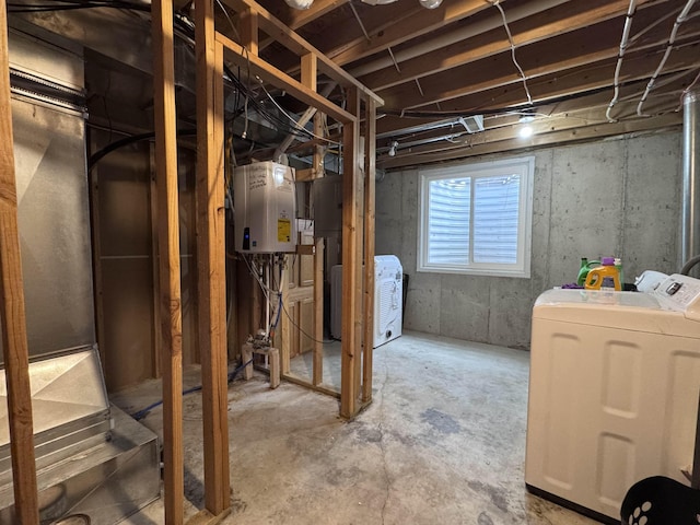 below grade area with washing machine and dryer and water heater