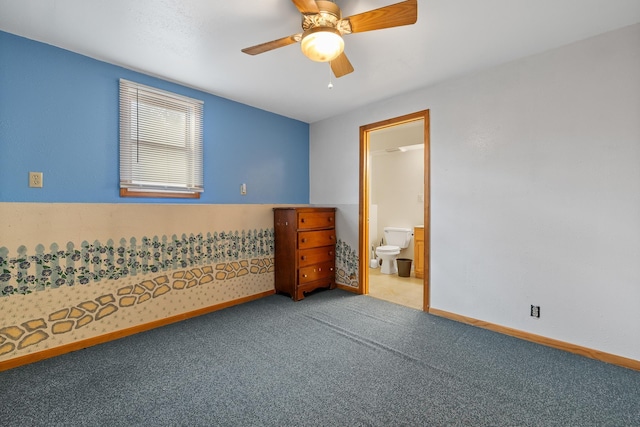 unfurnished room with carpet, ceiling fan, and baseboards