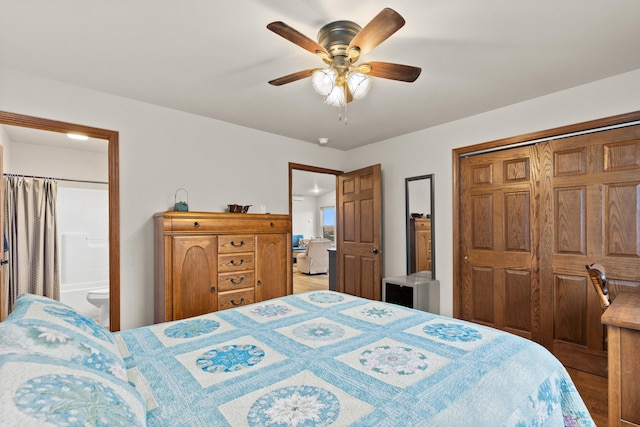 bedroom featuring a closet, connected bathroom, and a ceiling fan