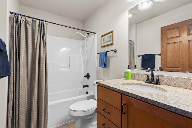 bathroom with shower / tub combo, vanity, and toilet