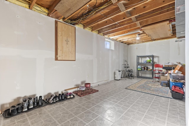 below grade area with tile patterned floors