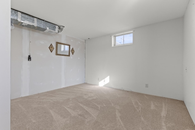 below grade area featuring carpet floors