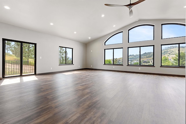 unfurnished room featuring baseboards, a ceiling fan, wood finished floors, and recessed lighting