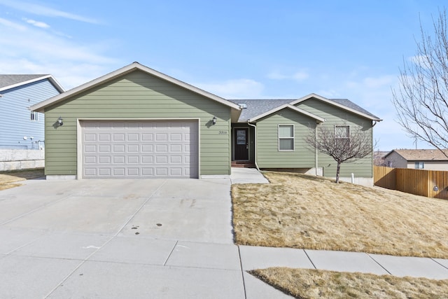 single story home with concrete driveway, roof with shingles, an attached garage, and fence