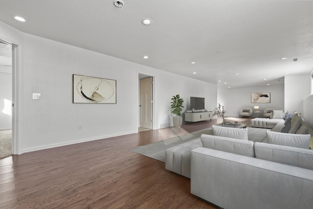 3316 Other, Rapid City, SD 57701 - living room featuring a textured ceiling, baseboards, wood finished floors, and recessed lighting