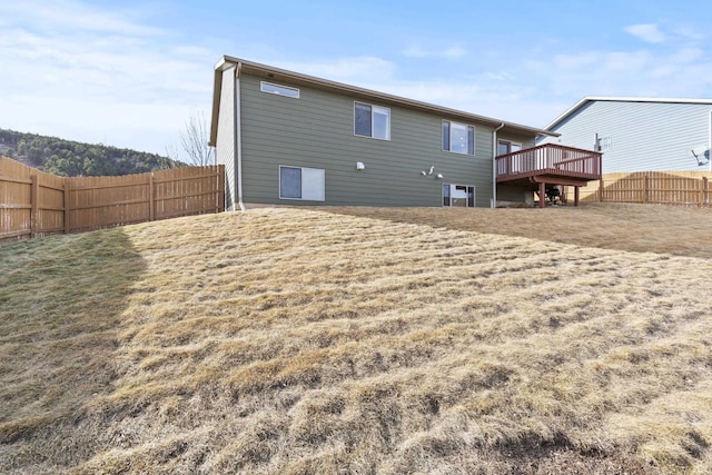 3316 Other, Rapid City, SD 57701 - rear view of house featuring a deck and fence