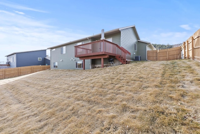3316 Other, Rapid City, SD 57701 - rear view of property featuring stairs, central AC, a lawn, and a fenced backyard
