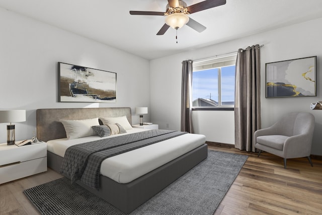 3316 Other, Rapid City, SD 57701 - bedroom with a ceiling fan and wood finished floors