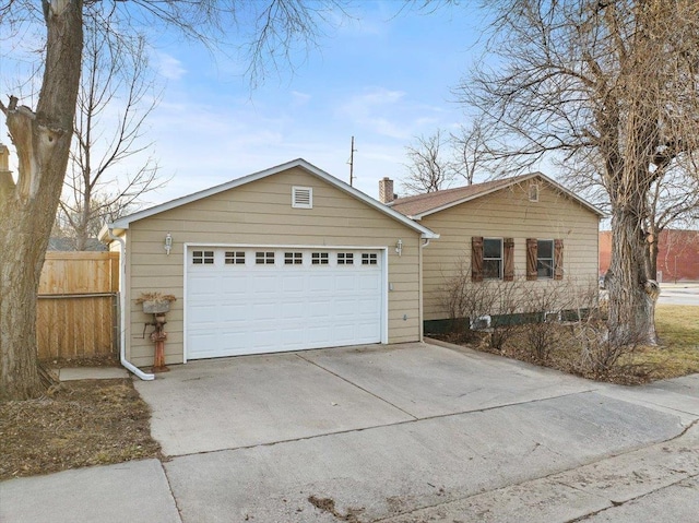 ranch-style house with a garage, a chimney, and fence