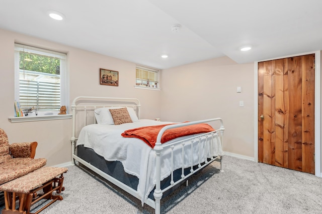 carpeted bedroom with baseboards and recessed lighting