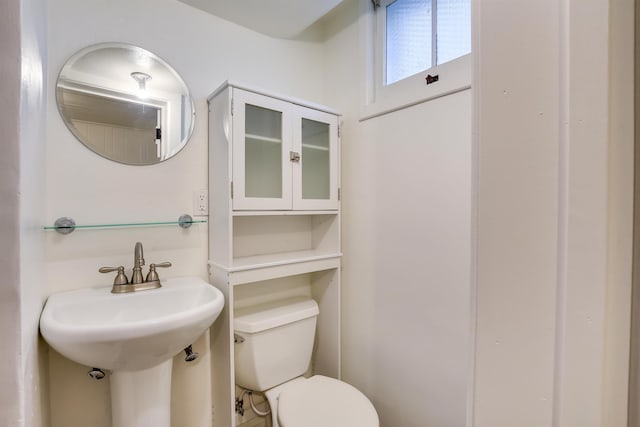 bathroom with a sink and toilet