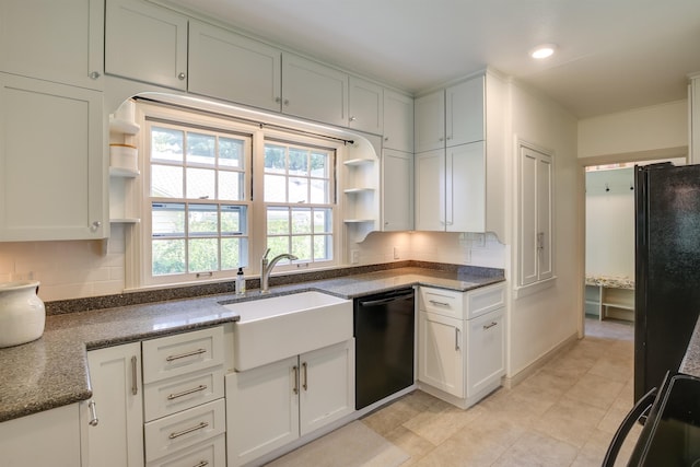 kitchen with light tile patterned flooring, open shelves, a sink, backsplash, and black appliances