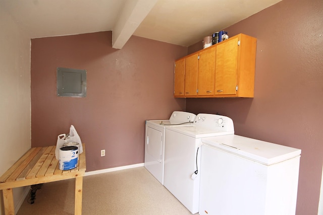 laundry room featuring cabinet space, electric panel, baseboards, and washer and dryer