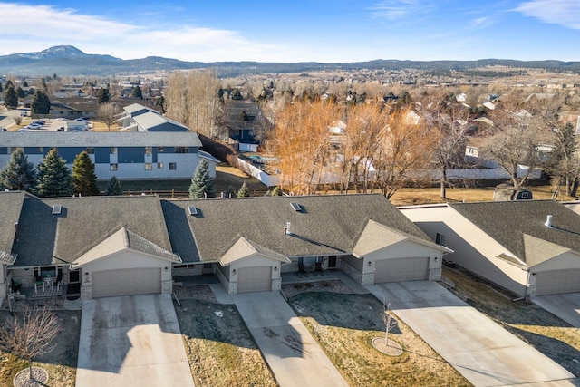 aerial view featuring a residential view and a mountain view