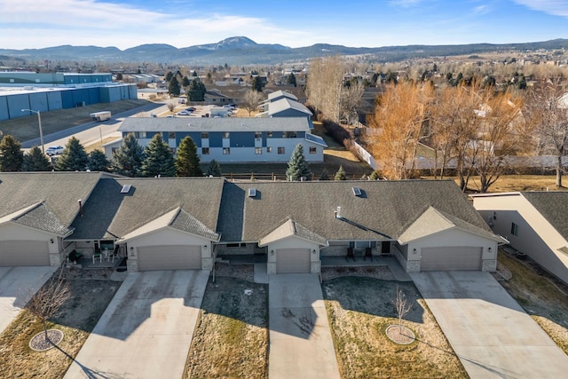 bird's eye view with a residential view and a mountain view