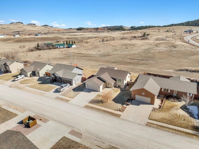 birds eye view of property with a residential view