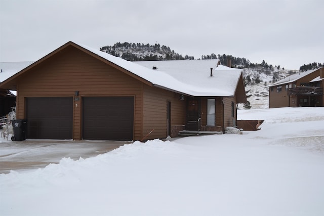 rustic home featuring a garage