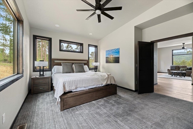 bedroom featuring ceiling fan, carpet, visible vents, and baseboards