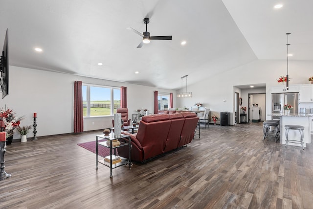 living room featuring high vaulted ceiling, dark wood finished floors, a ceiling fan, and recessed lighting