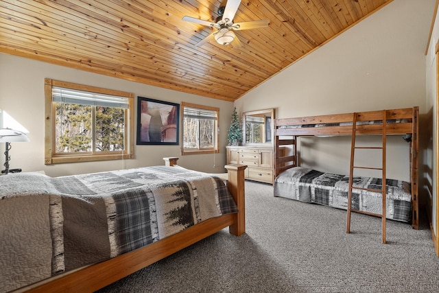 bedroom featuring lofted ceiling, carpet flooring, and wood ceiling