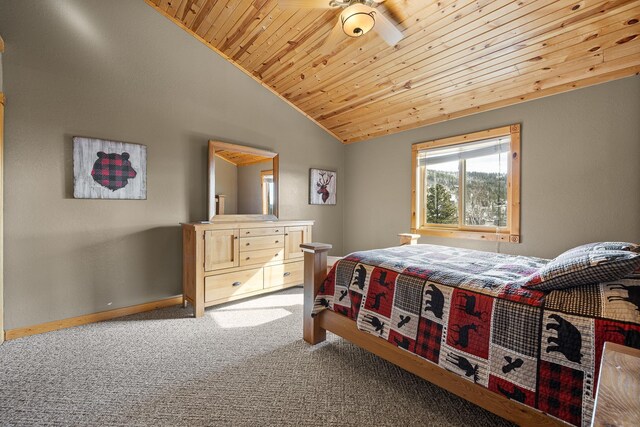 bedroom with wooden ceiling, carpet flooring, vaulted ceiling, and baseboards