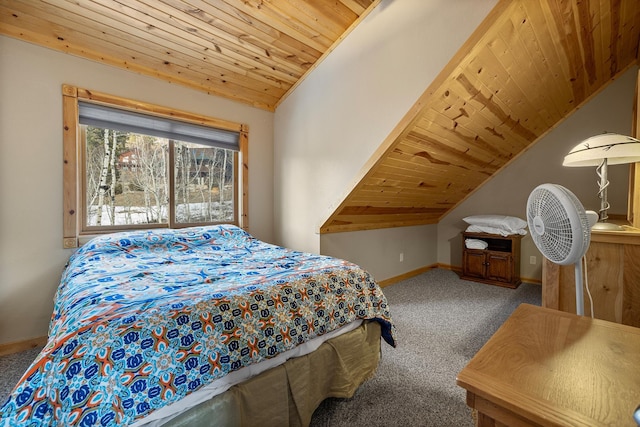 carpeted bedroom with wood ceiling, baseboards, and vaulted ceiling