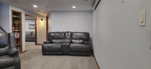 interior space with carpet floors, recessed lighting, visible vents, and baseboards