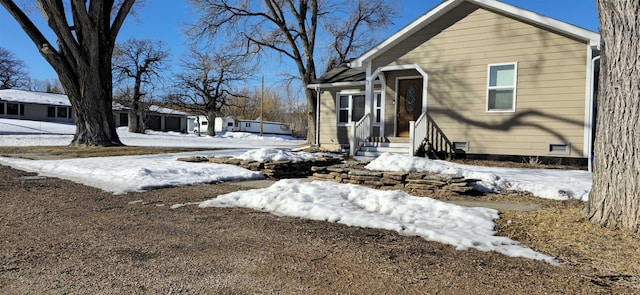 view of front of property with crawl space