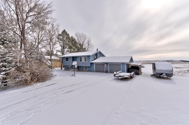 view of front of home with a garage