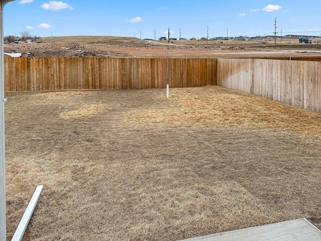 view of yard featuring a fenced backyard