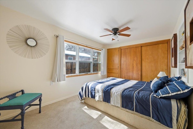 carpeted bedroom with baseboards