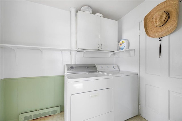 laundry room featuring cabinet space and washer and dryer