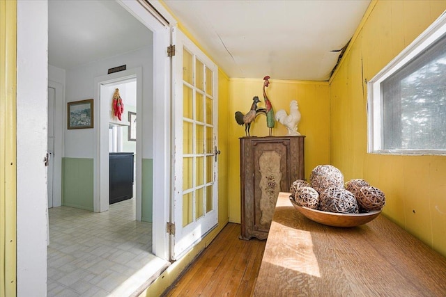 hallway with wood finished floors