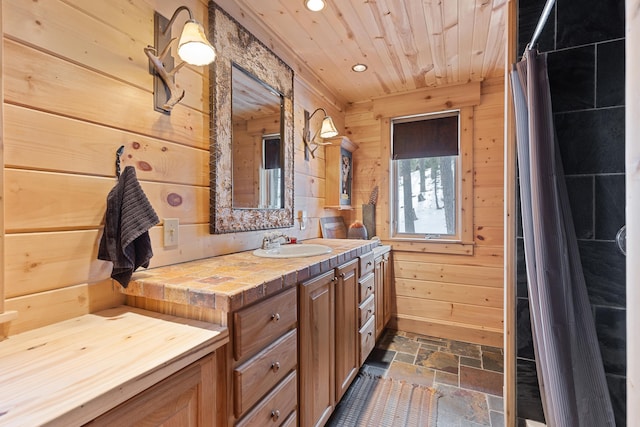 full bath with stone tile floors, wood walls, and wooden ceiling